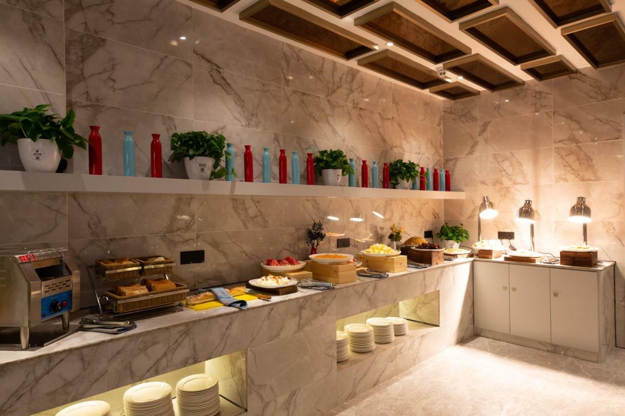 Meihao Manju Hotel Иу Экстерьер фото