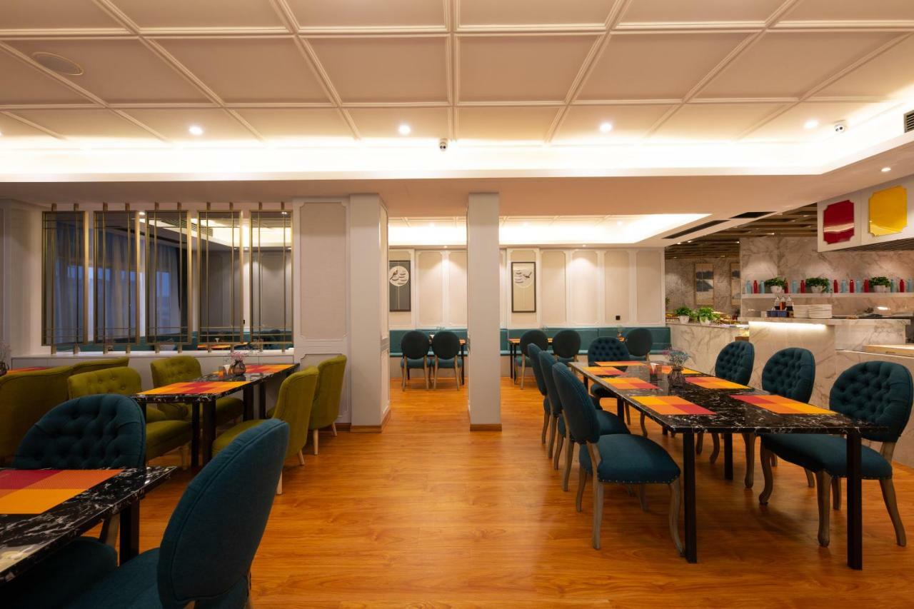 Meihao Manju Hotel Иу Экстерьер фото