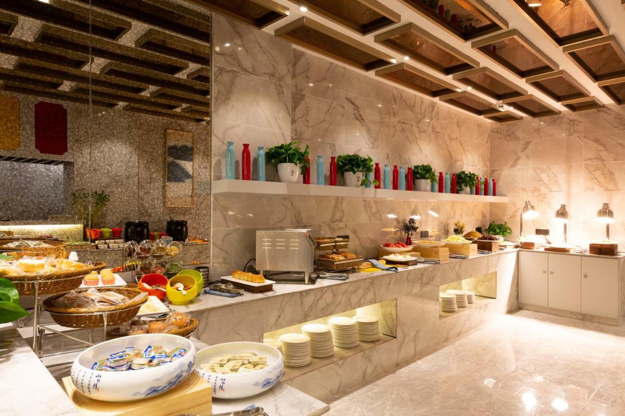 Meihao Manju Hotel Иу Экстерьер фото