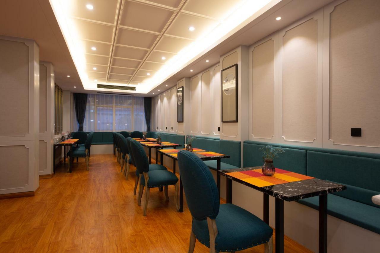 Meihao Manju Hotel Иу Экстерьер фото