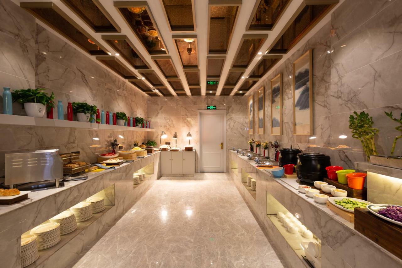 Meihao Manju Hotel Иу Экстерьер фото