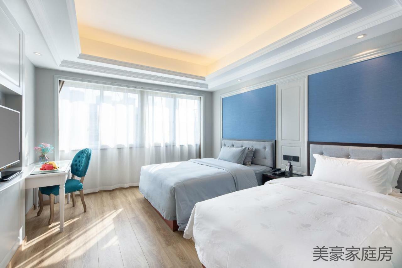 Meihao Manju Hotel Иу Экстерьер фото